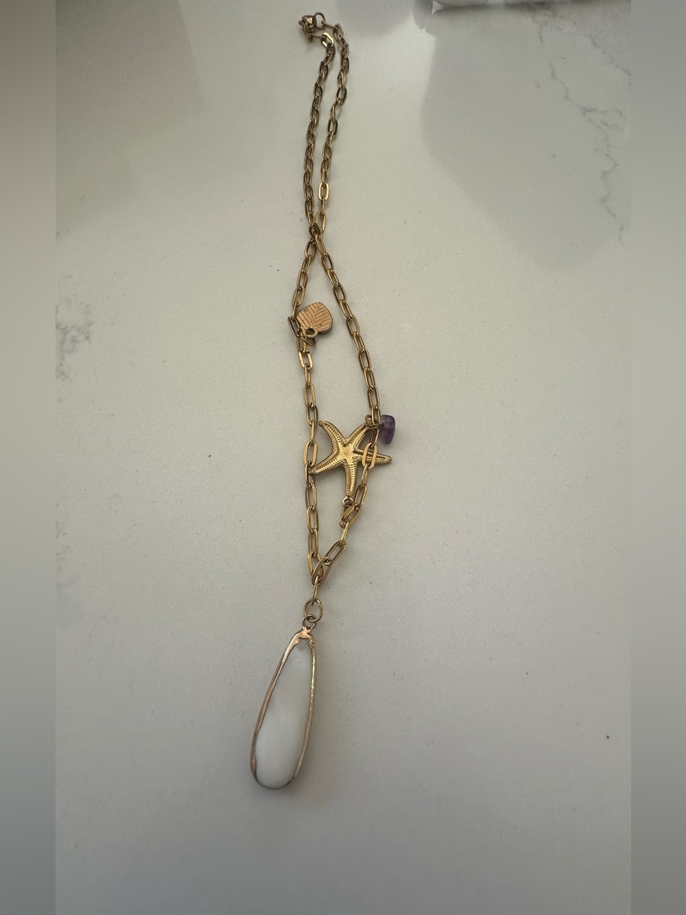 Gold and Purple Necklace with Elegant Design